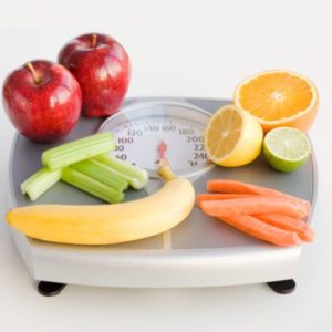 fruits on weighing machine