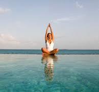 doing yoga in beach